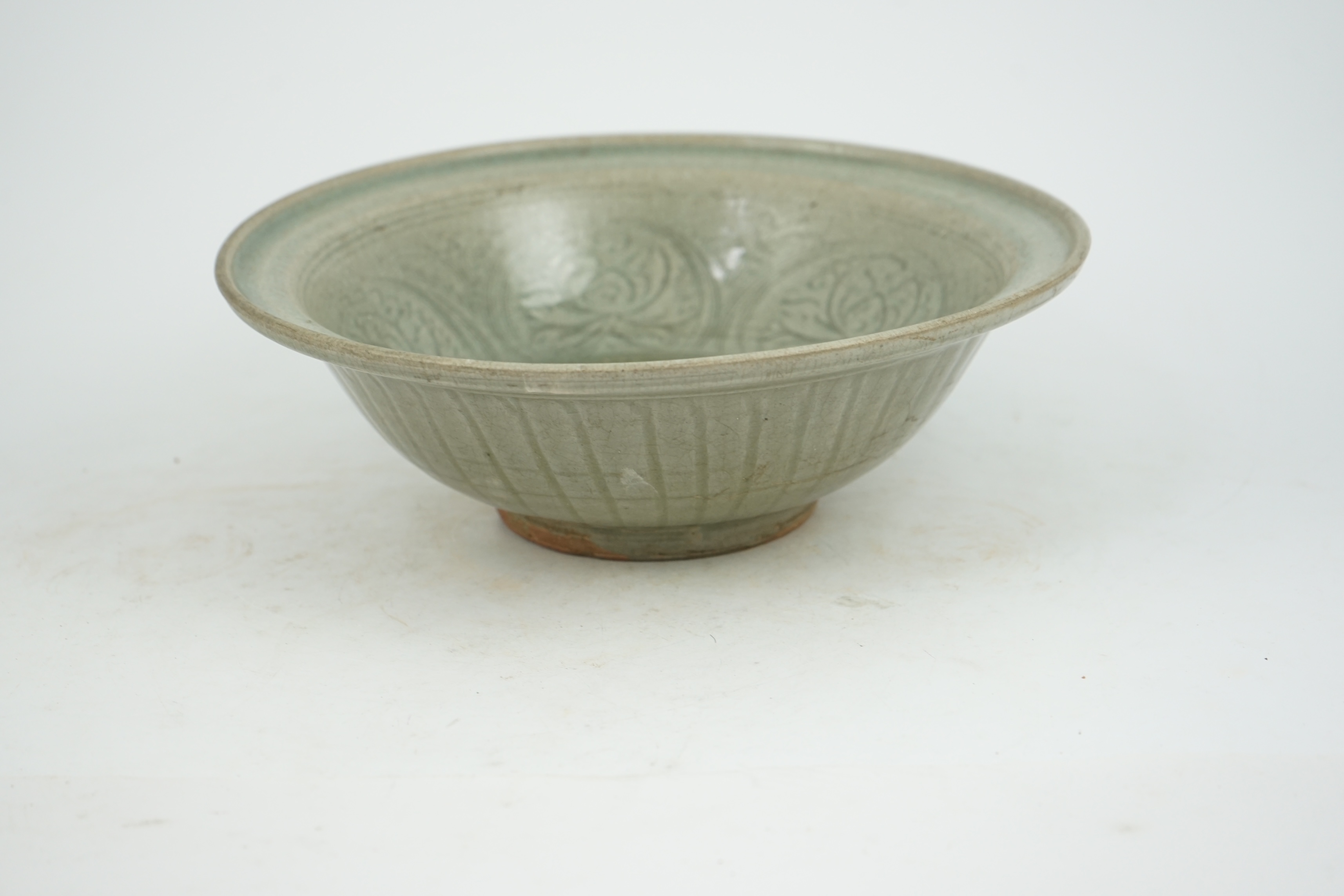 A large Thai celadon glazed bowl, Sawankhalok kilns, 14th / 15th century